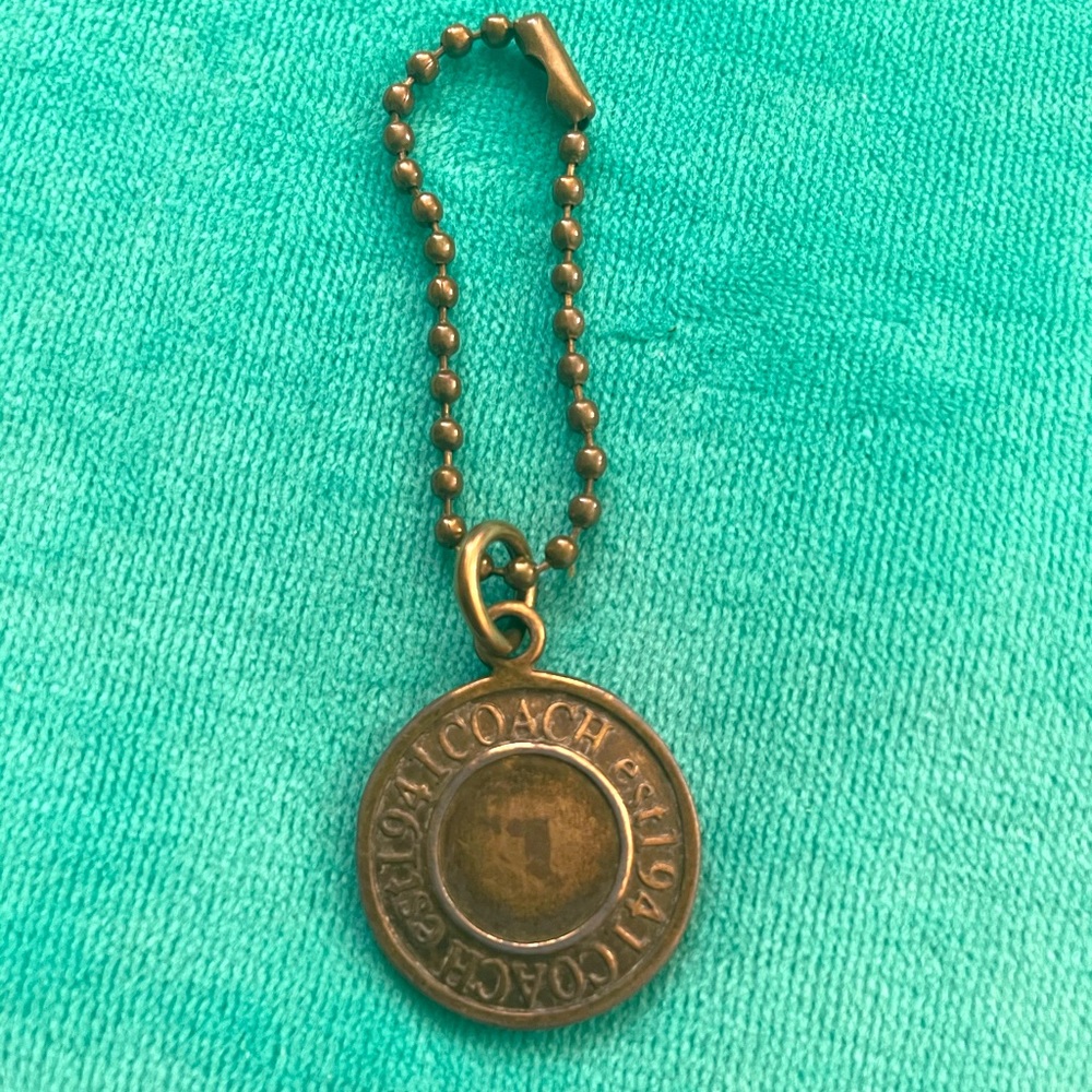 Vintage Coach brass key fob hang tag